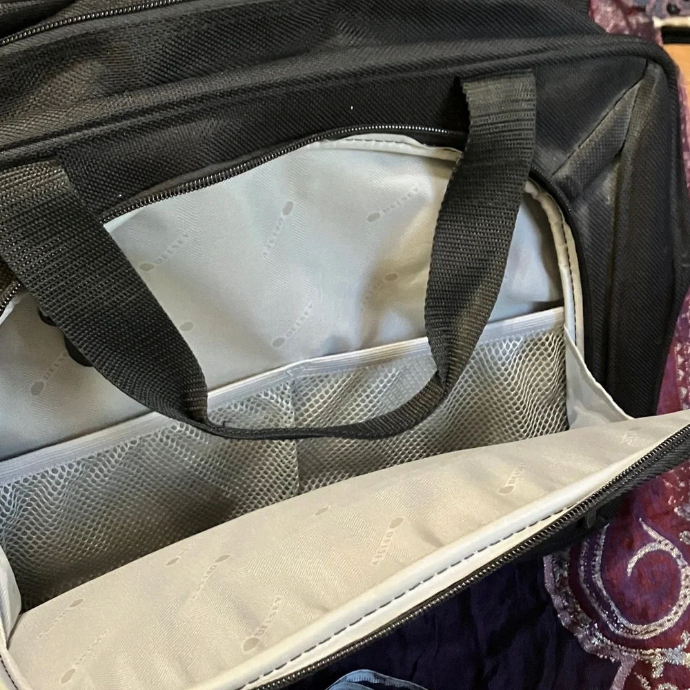 Delsey rolling carry on luggage bag